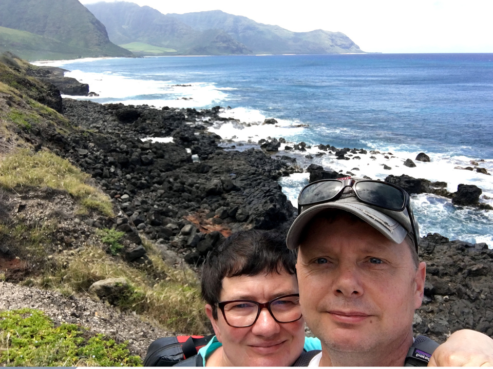 Two hikers on the way to Ka'ena Point on the northwest side of Oahu.