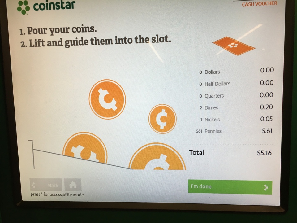 The Coinstar machine in the supermarket accepts coins and issues vouchers for a fee.