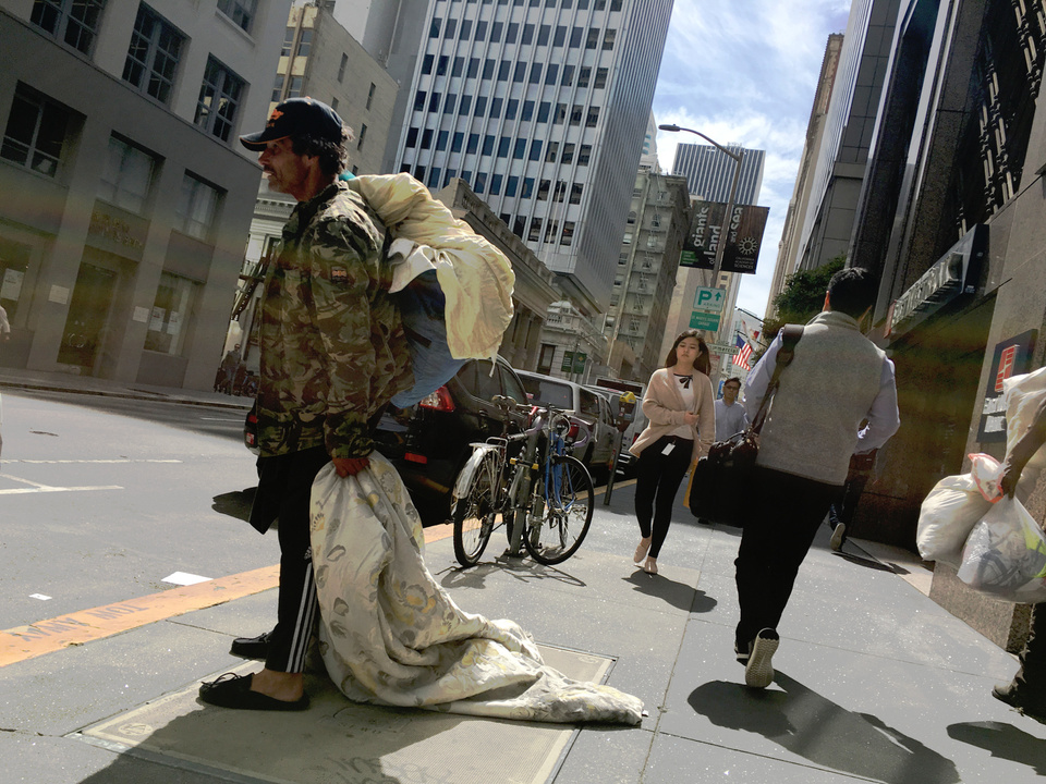 An obviously mentally confused homeless person in the Financial District.