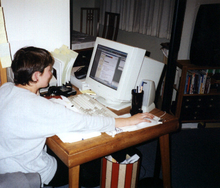 Angelika at the new computer in the living room